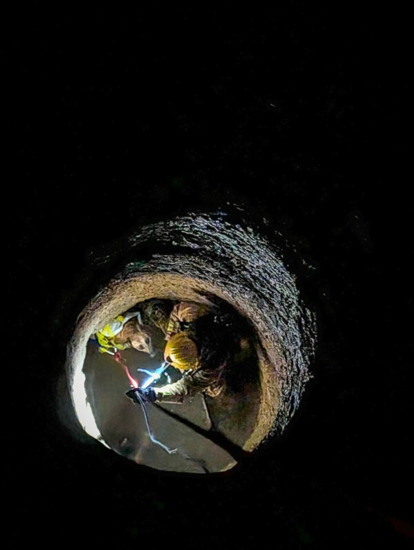 Emotional Rollercoaster: Rescuers Find Furry Friend 60 Feet Down-1